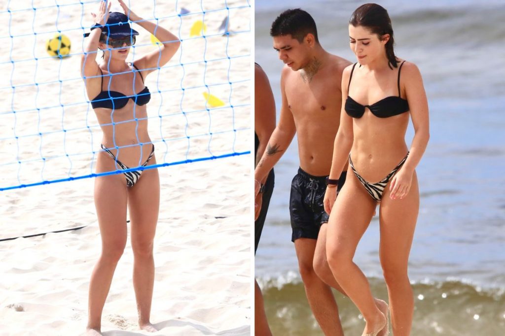 Jade Picon jogando futevôlei e com amigo na praia