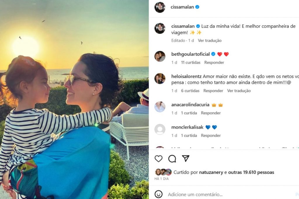 Cecília Malan com a filha, com pôr do sol ao fundo